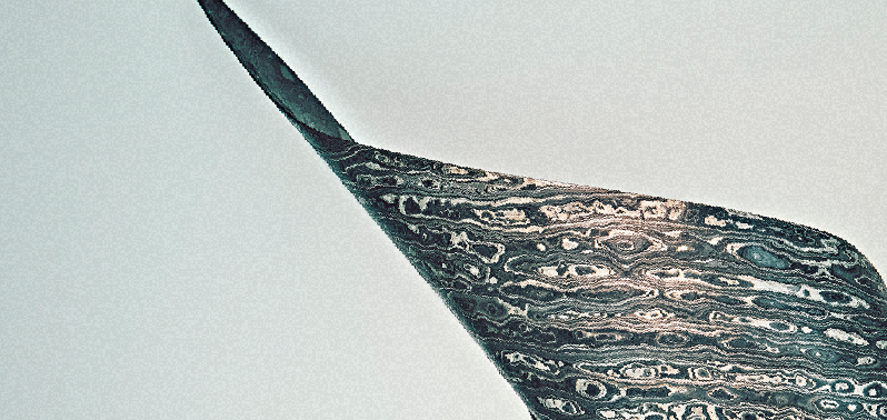 白い壁に大きく描かれた「TOCH HOLDINGS」のロゴ